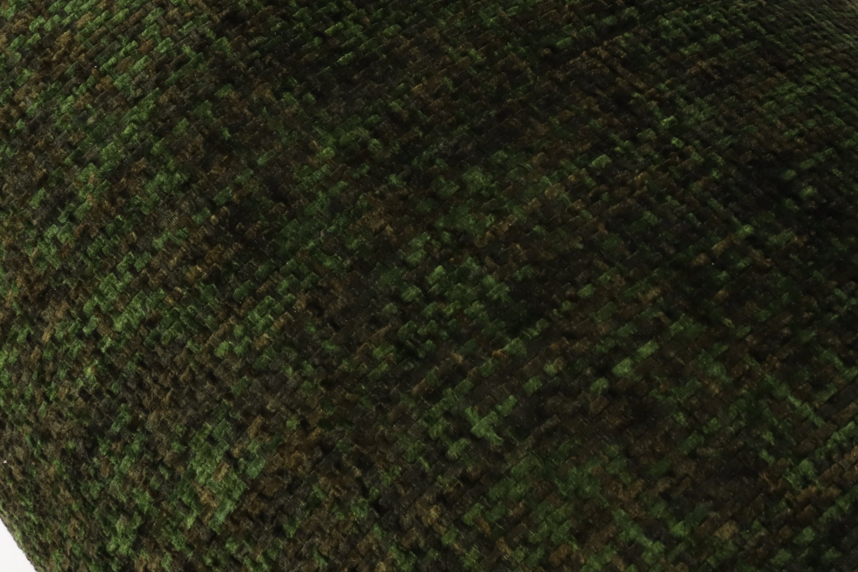 Close-up of Textured Woven Fabric on Moss Green Accent Chair