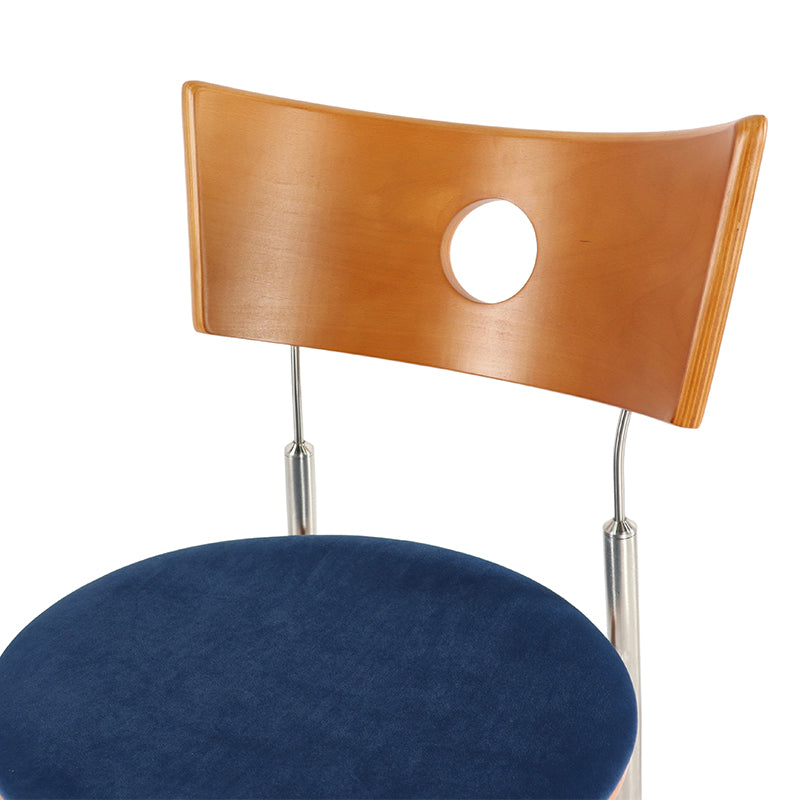 Close-up of Curved Plywood Backrest on Versatile Velvet Chair